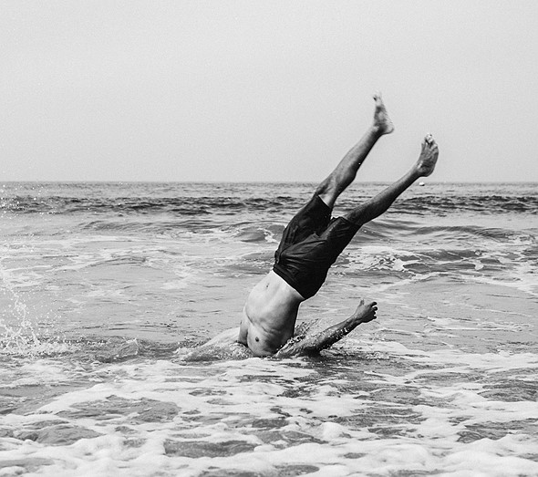 Nic-Walton---JOSHUA-ROSE---head-stuck-in-ocean-water-feet-straight-up-clipped