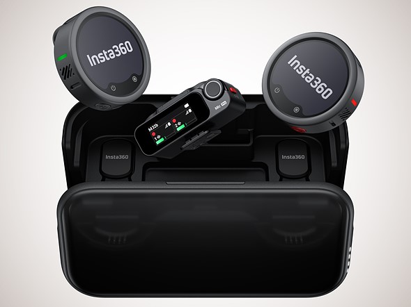 a mic pro case sits with the transmitters and receiver floating out of it
