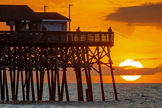 kodakrome-orange-sunset-ocean-peer-fishing
