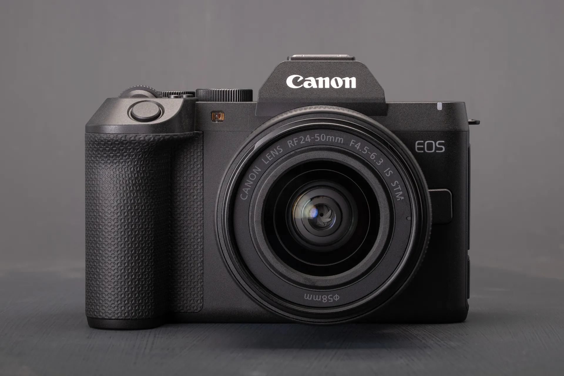 The EOS R8 II, seen from the front, with the RF 24-50mm F4.5-6.3 IS STM lens attached.